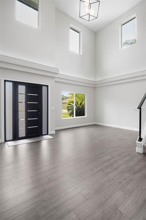 Grand foyer and view in to living room