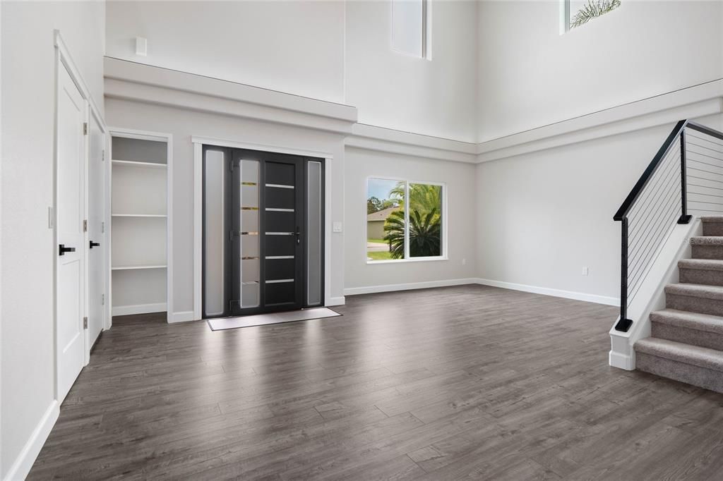 Another view in to the grand foyer and living room