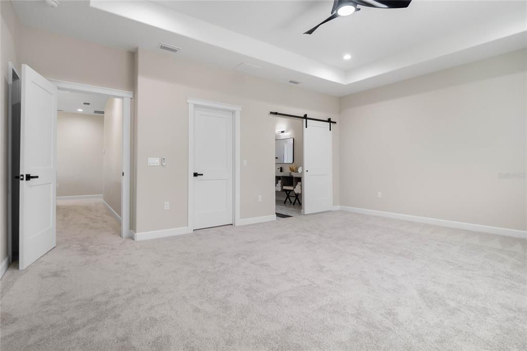 Upstairs owners suite with tray ceiling