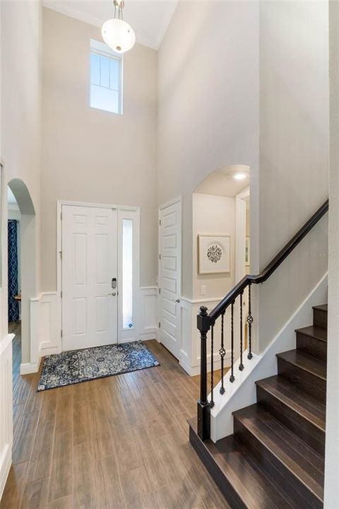 Wood Staircase leads to 2nd Floor