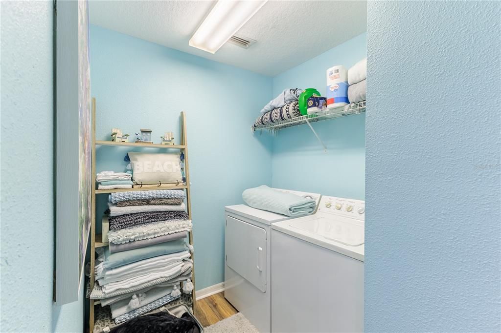 Laundry room with access to garage