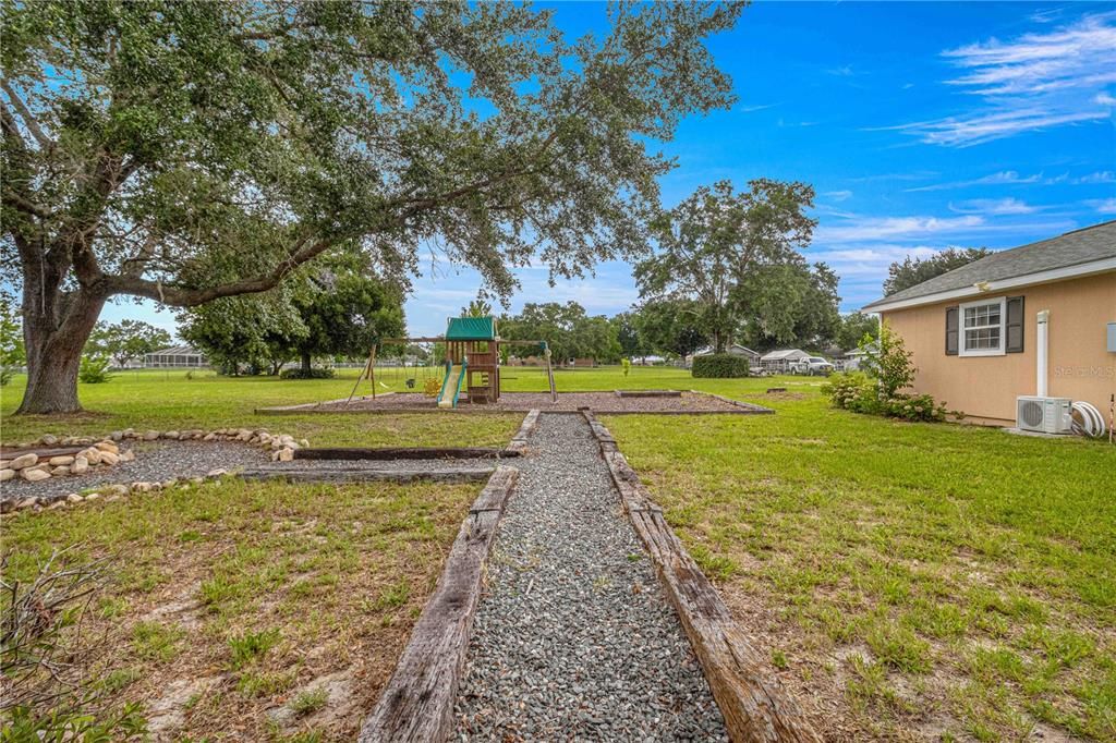 Fenced Back Yard /Fire Pit/ Play Area