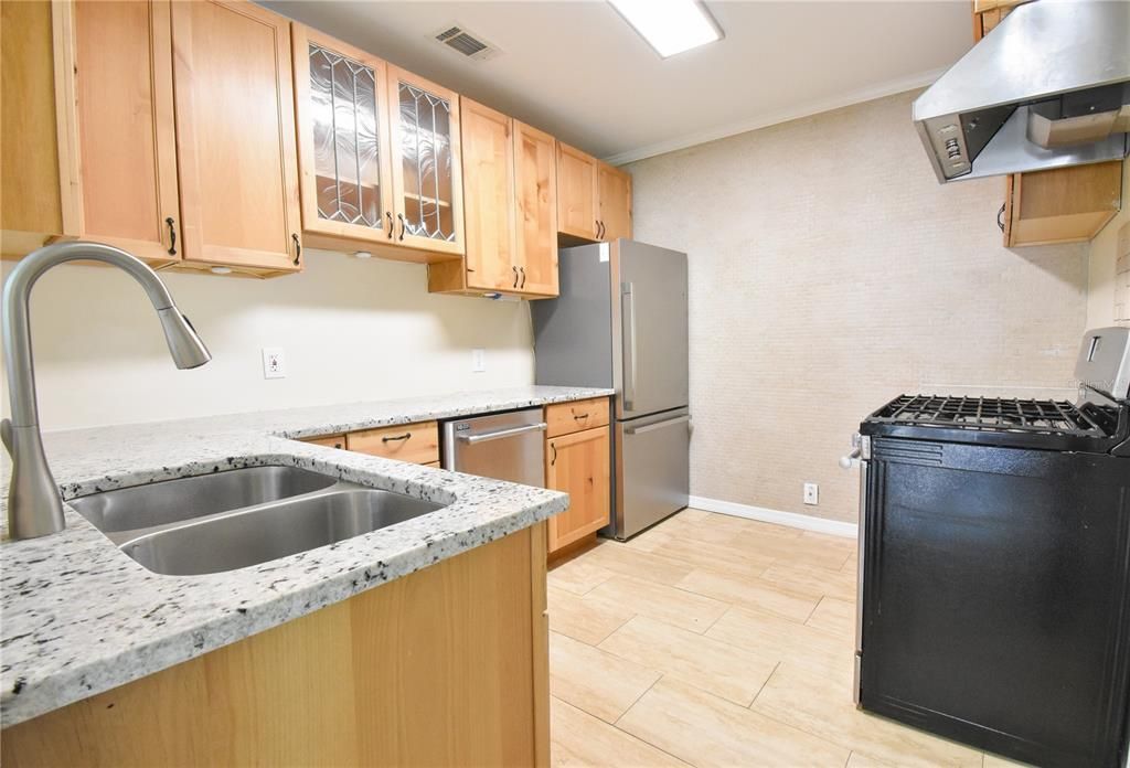 Kitchen with Stainless Steel New Refrigerator