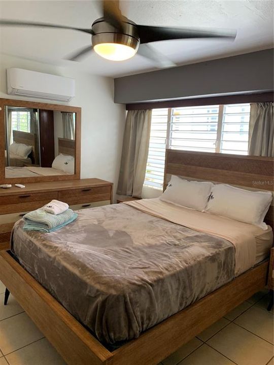 Second bedroom with queen size bed and AC