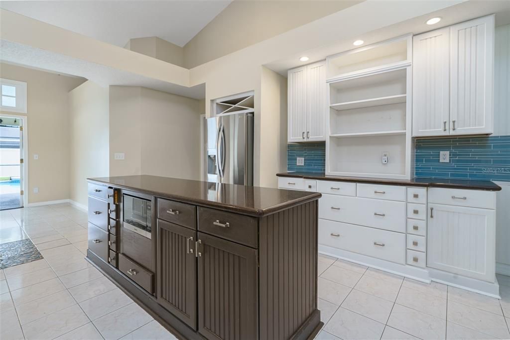 Kitchen island with microwave.