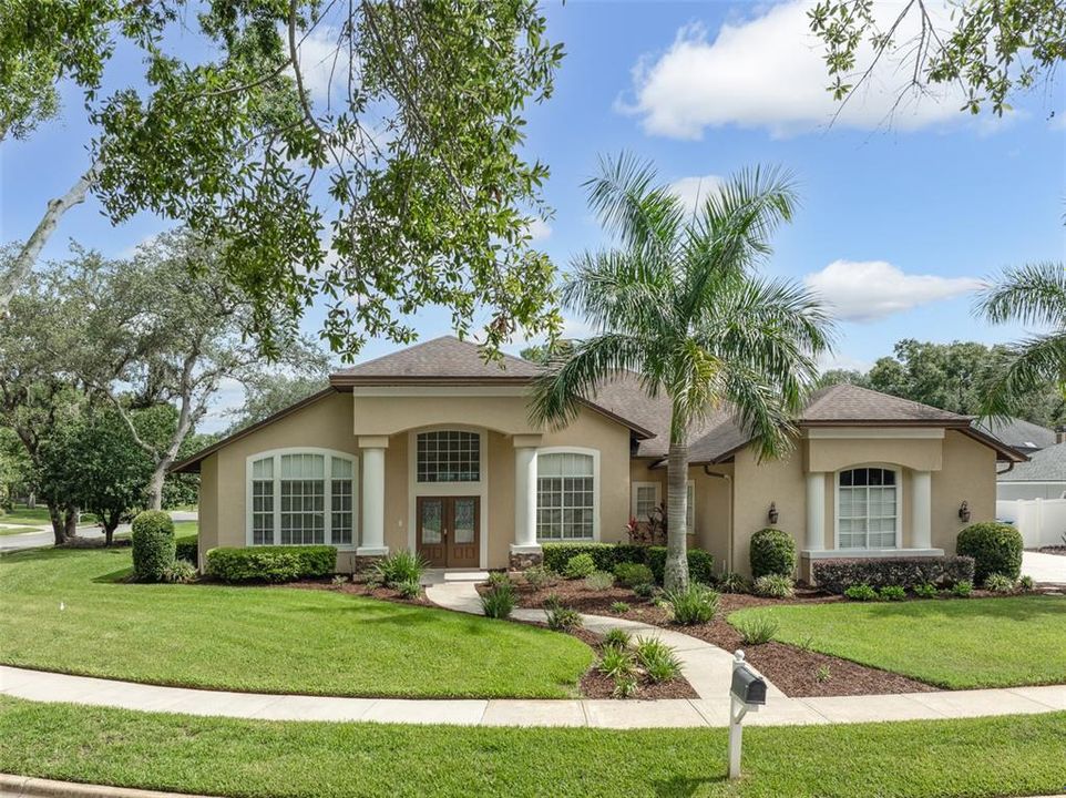 Exterior of home on large corner lot.