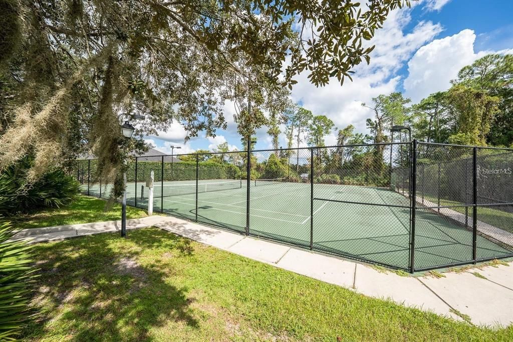 Tennis Courts next to the dock entrance.