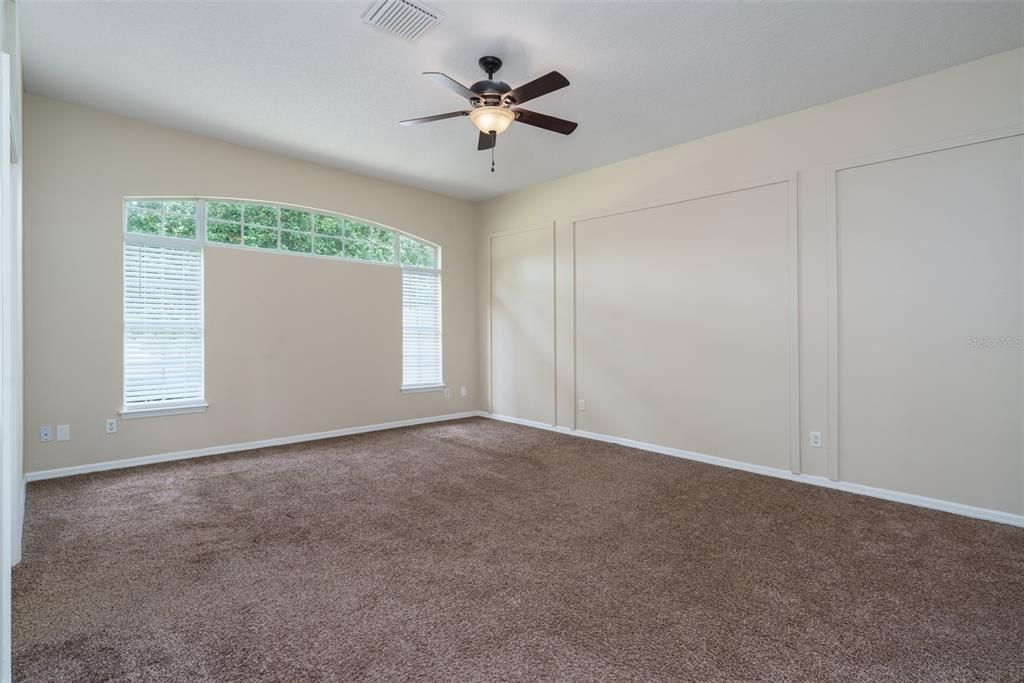 Large owner's suite bedroom.