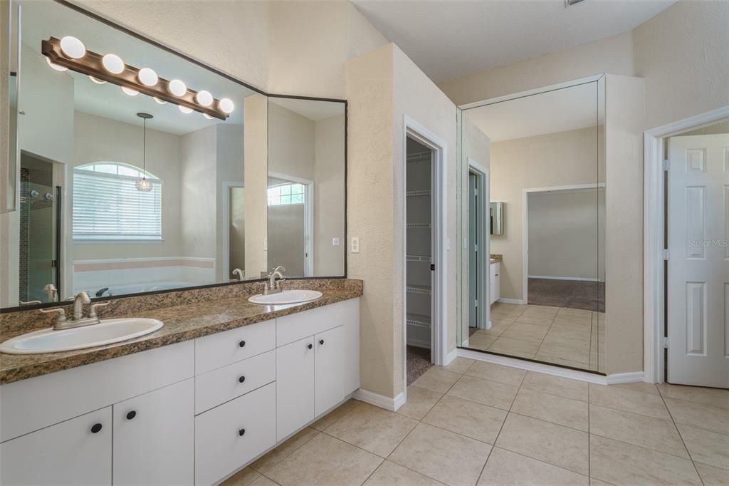 Owner's bathroom with dual sinks.