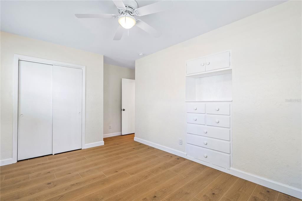 2nd bedroom with built in dresser