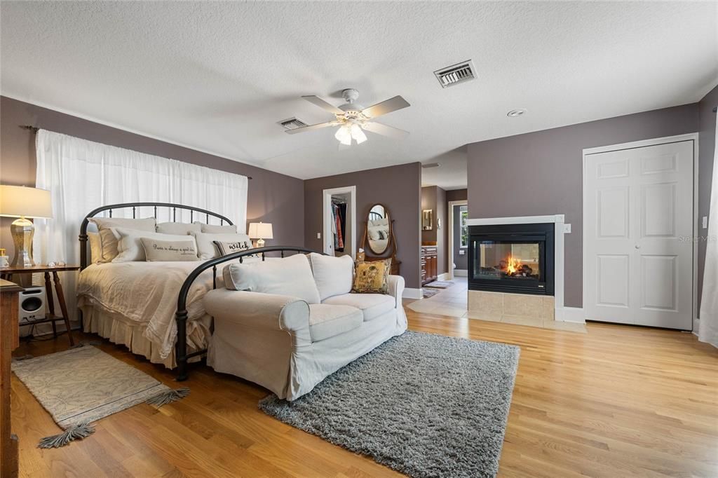 primary bedroom ensuite w/ gas fireplace