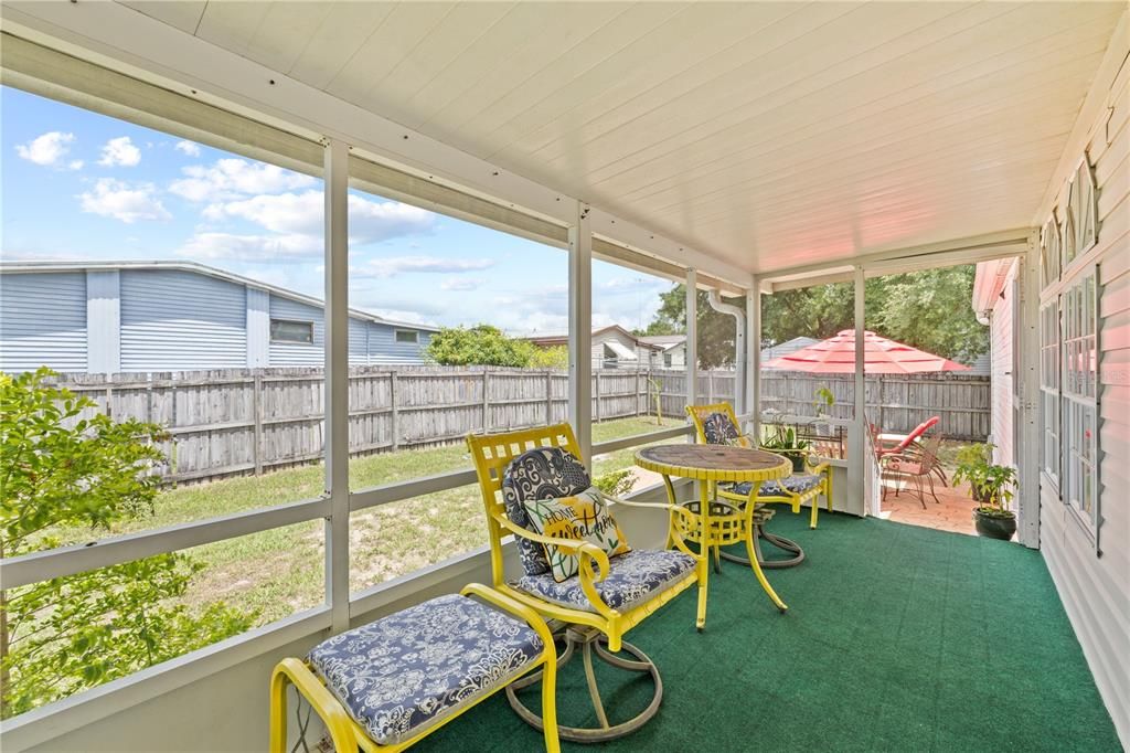 Covered screened in patio.