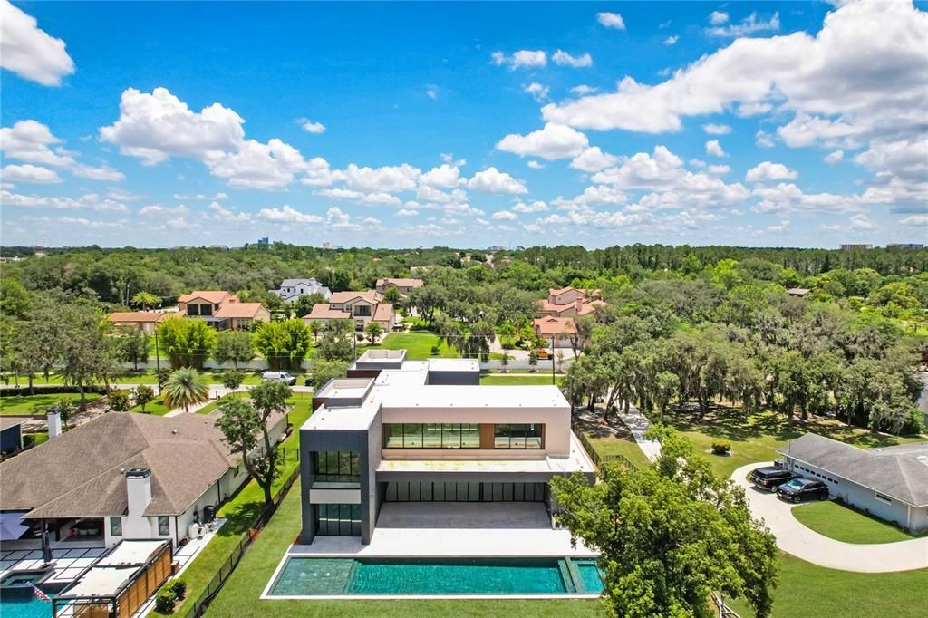 Welcome to 10424 Pocket Ln, Orlando, FL 32836Redefining luxury, with sleek lines, opulent finishes, and cutting-edge smart home technology**Estimated completion September/ October 2024. Picture virtually enhanced depicting home with grass in place