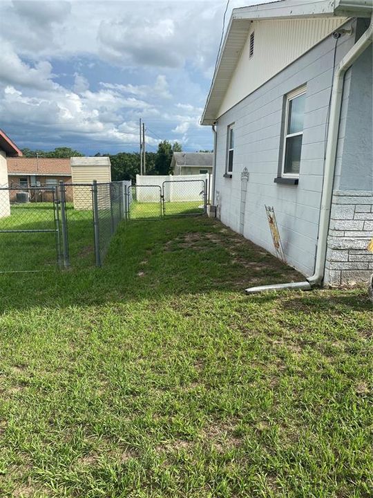 west side of house with RV connection