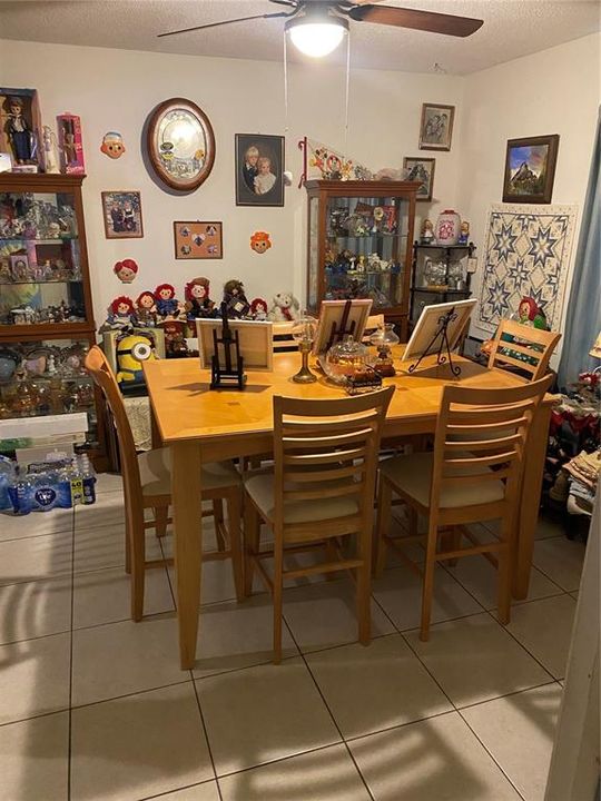 Dining room tablewith 6 chairs and 2 china cabinets fit here