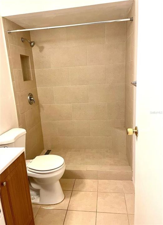 Bathroom with updated shower