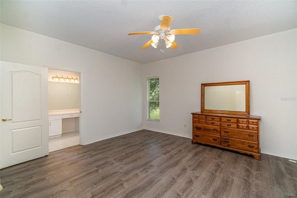 Primary bedroom with built in shelving