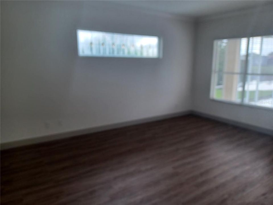 Primary Bedroom showing decorated transom