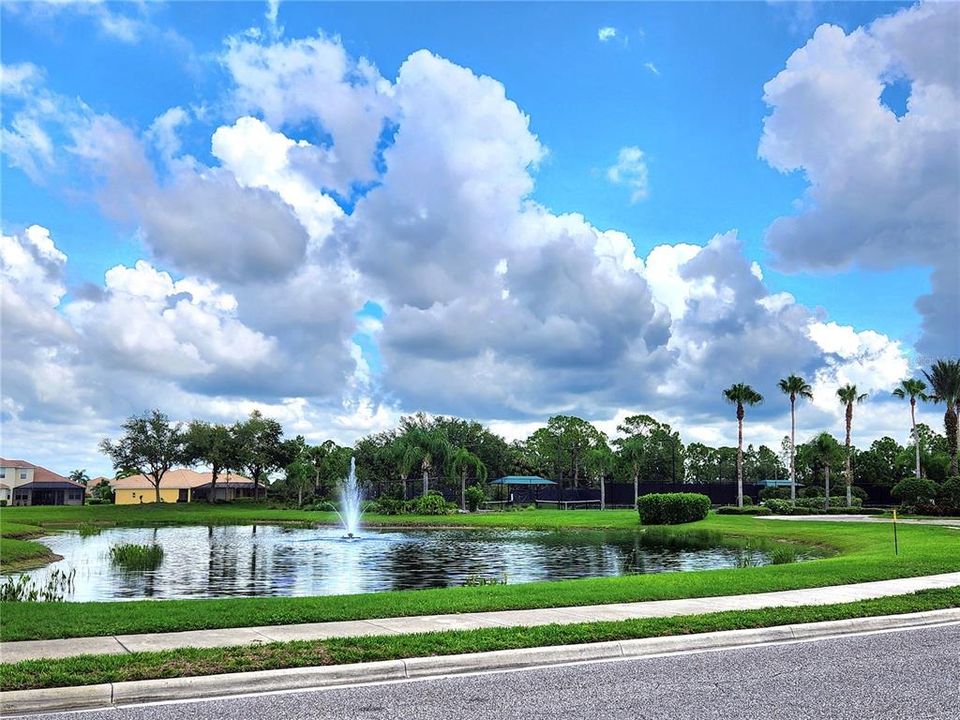 fountain near clubhouse entrance.  Shortly after entering community on the right.