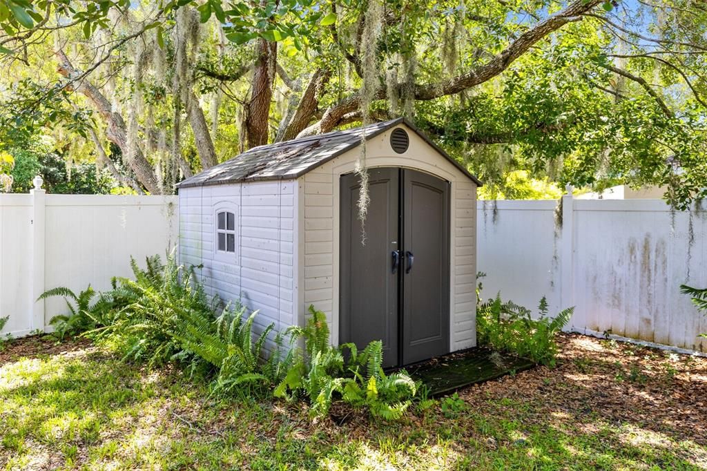 A convenient shed provides storage for all your lawn and gardening equipment.