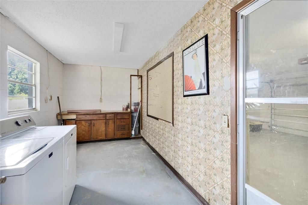 Off the kitchen, a great-sized laundry room offers space for your washer and dryer as well as additional storage.