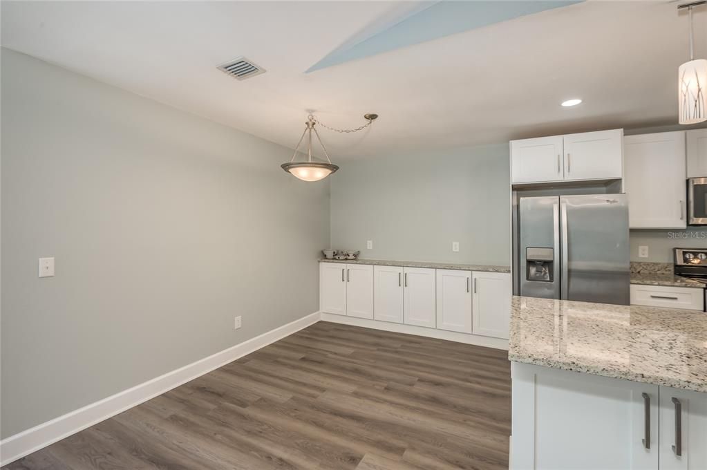 Dinette area with buttlers cupboards