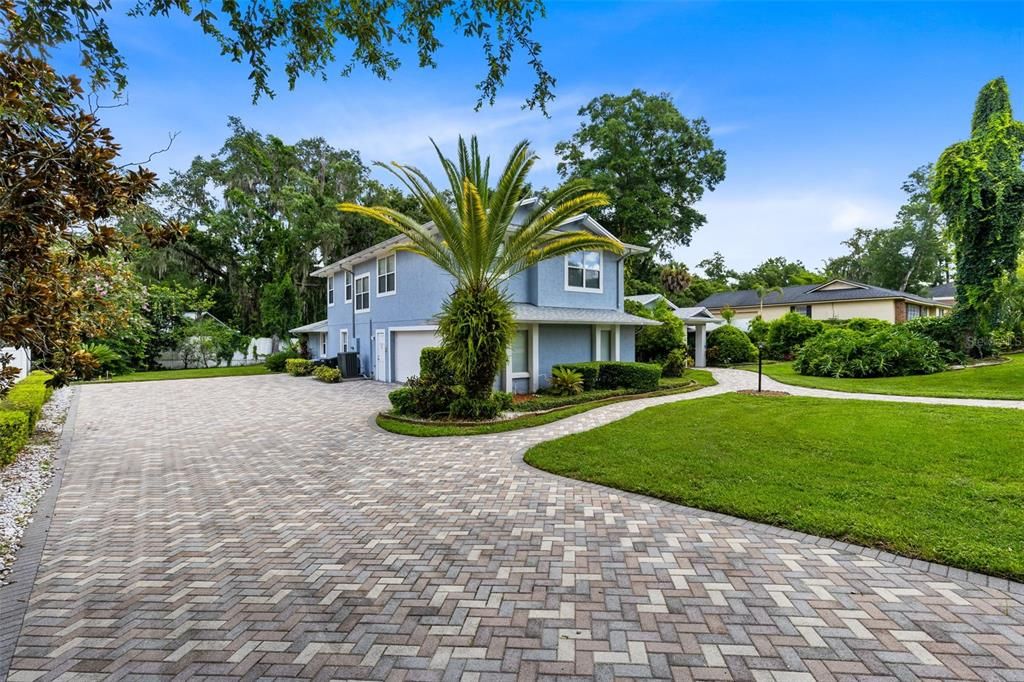 A view of the extended driveway and oversized two car garage.