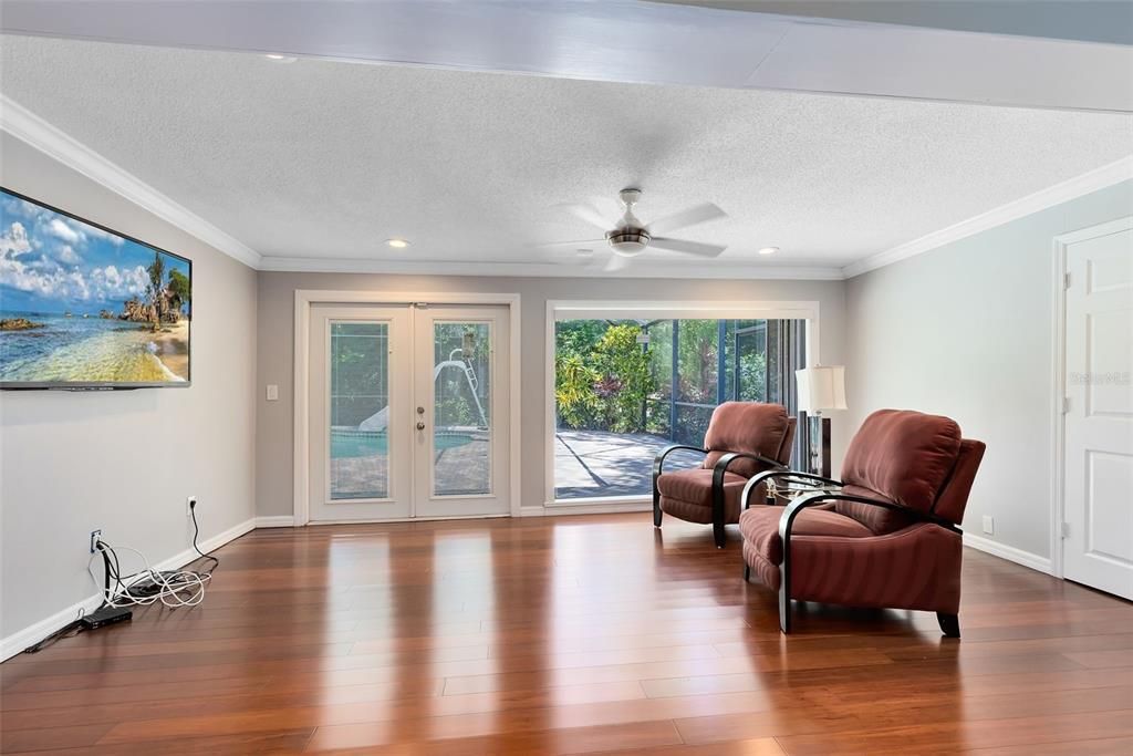 With direct access to the pool, you can enjoy a refreshing dip just steps from your bedroom. Large windows provide breathtaking views of the pool and backyard, creating a tranquil atmosphere.