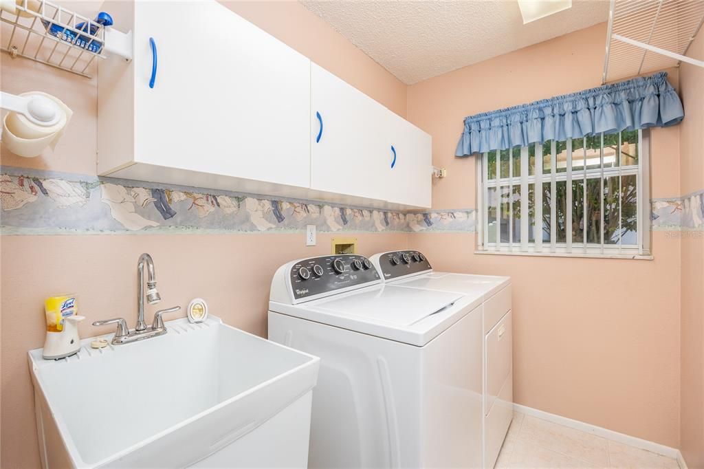 Laundry Room with sink and storage