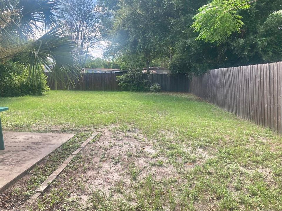 partially fenced backyard