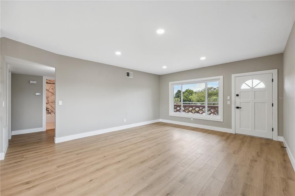 large spacious living room as you enter