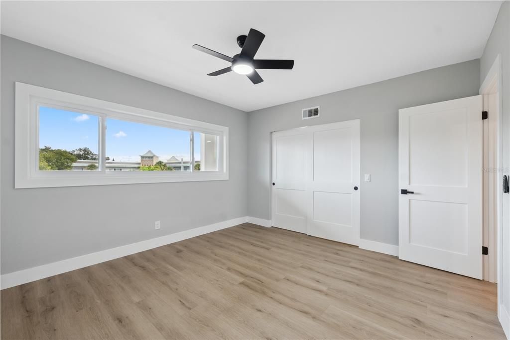 second guest room with large closet and updated doors