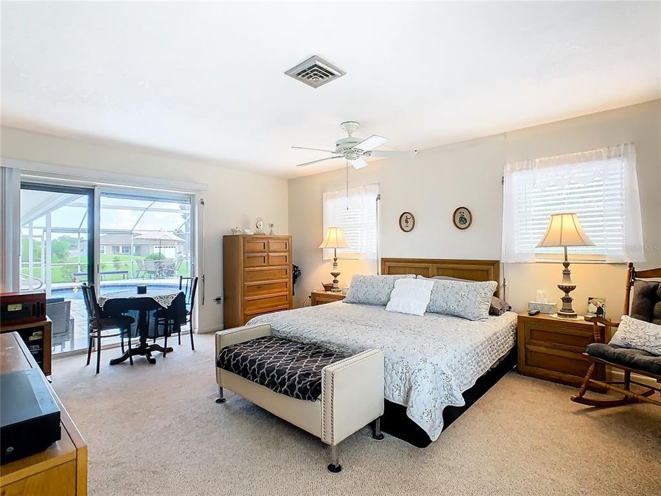 The master bedroom is 16' x 22'.  A pool view is available from the kitchen, family room and master bedroom.