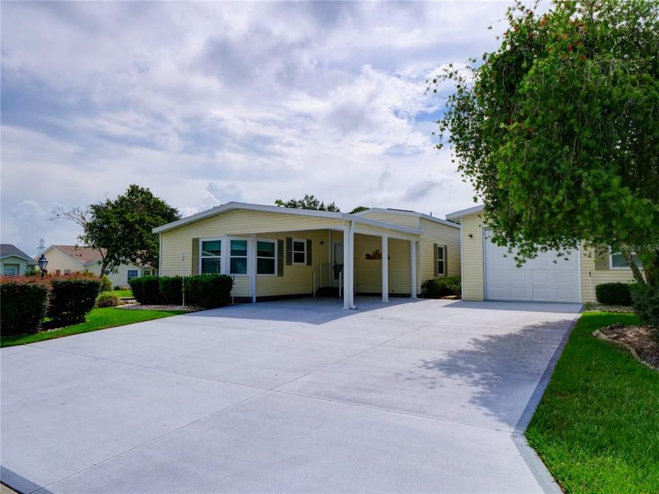 Triple Wide with Carport and Detached Garage