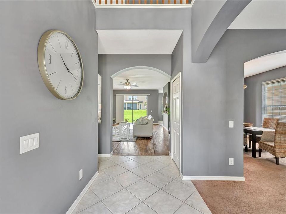 The foyer leading to the Living Room and the Family Room to your right