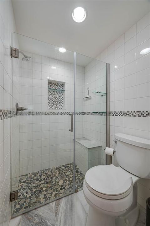 Primary batrhoom.  Fully tiled shower