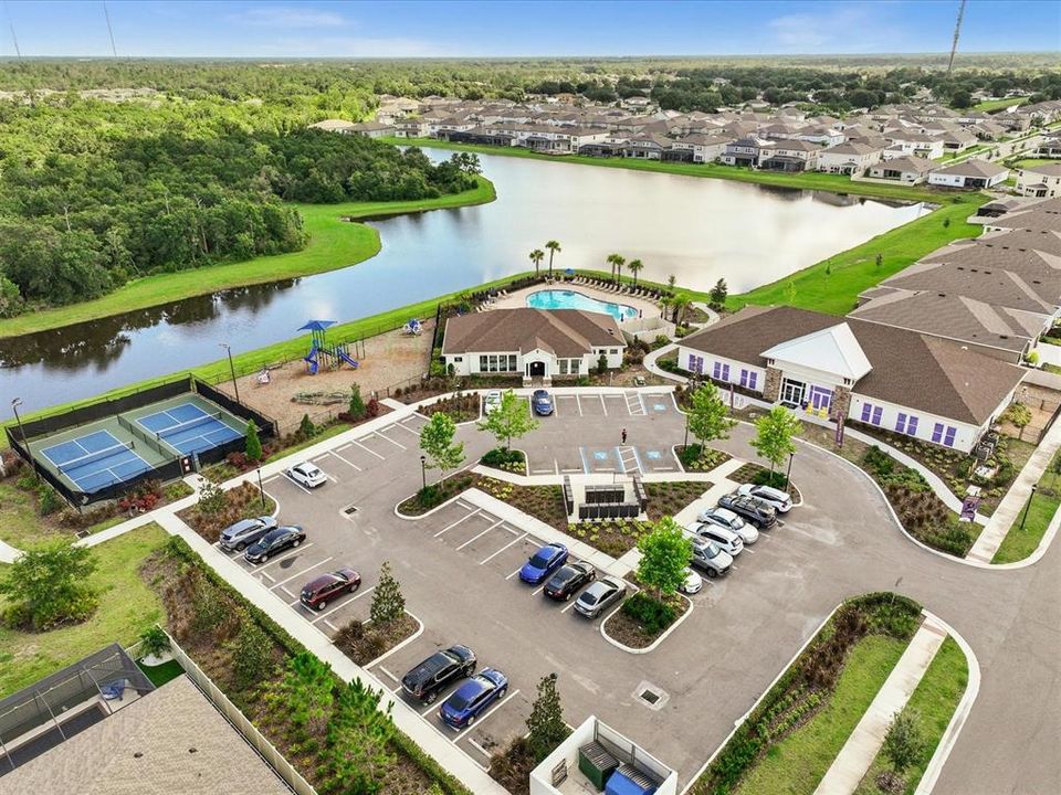 Community Area with Tennis courts, playground, clubhouse and pool.