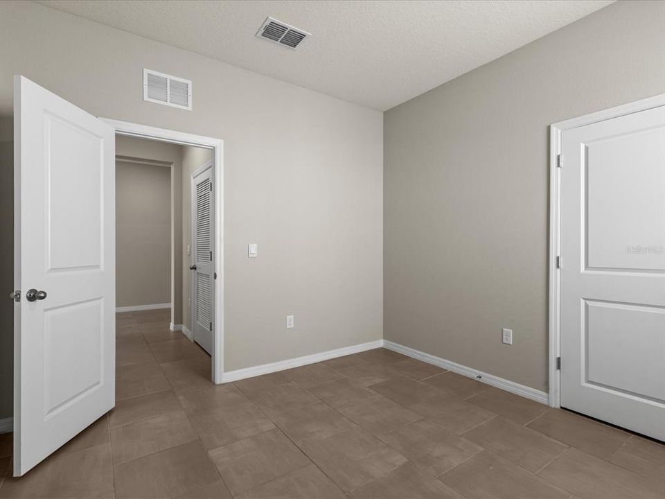 Inside Laundry room with Garage access