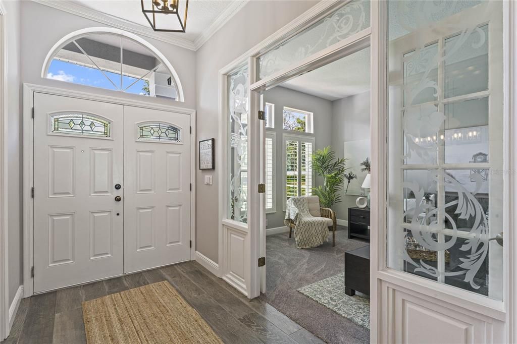 Your kitchen and bathrooms have all undergone a beautiful remodel adding to the light and bright feel of the OPEN CONCEPT floor plan also featuring crown molding, WOOD LOOK TILE FLOORS, formal and flex spaces!