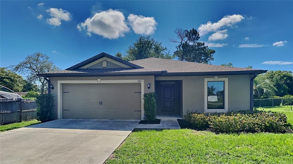 Welcome to Deltona Lakes and this lovely Amelia floor plan built by LGI Homes in 2019 offering a single story layout with 3-bedrooms, 2-full baths, an OPEN CONCEPT and plenty of upgrades!