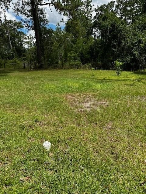 3.43 acres with 2nd gate into back property.