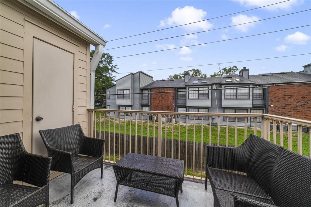 The balcony offers additional storage and a quiet place to enjoy a cup of coffee in the morning or your favorite beverage in the evening overlooking a grassy area.