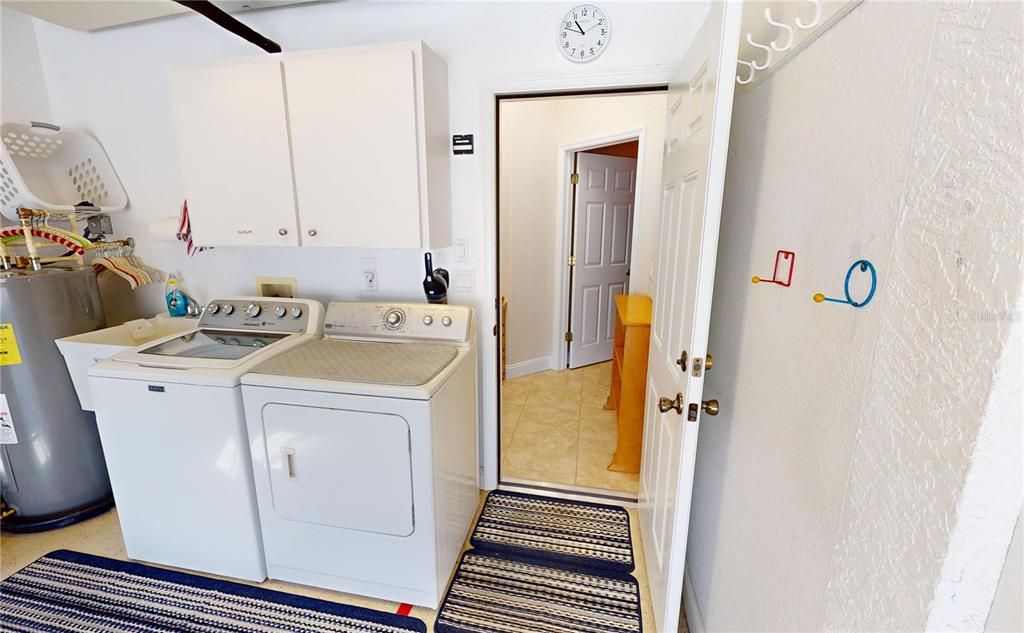 Laundry in garage (could  be put back in what now is the office