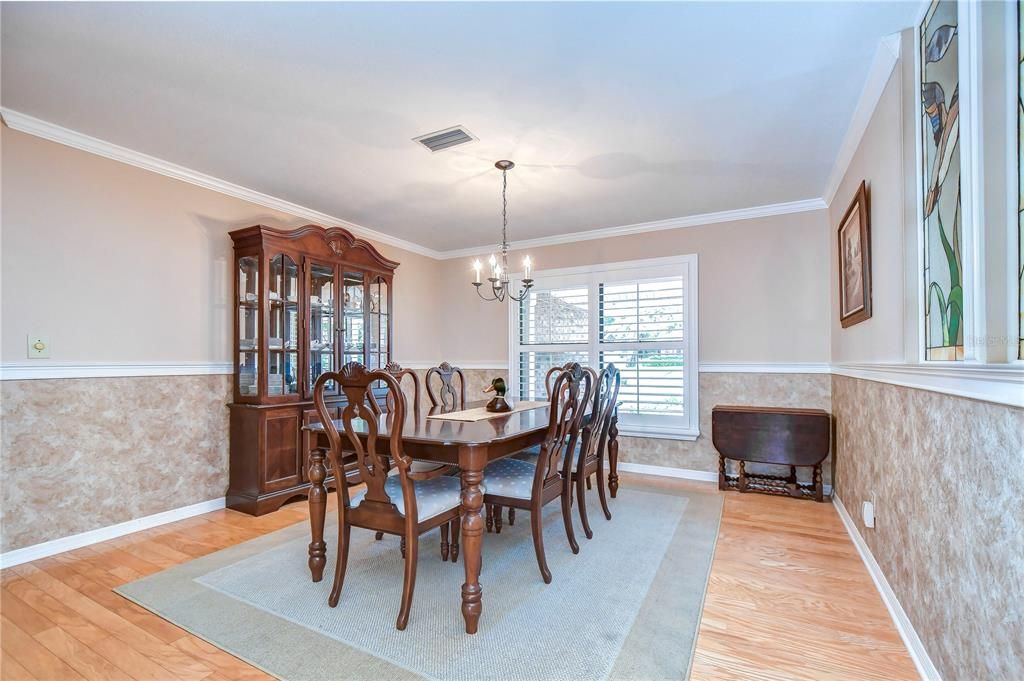 Formal living room offers crown molding!