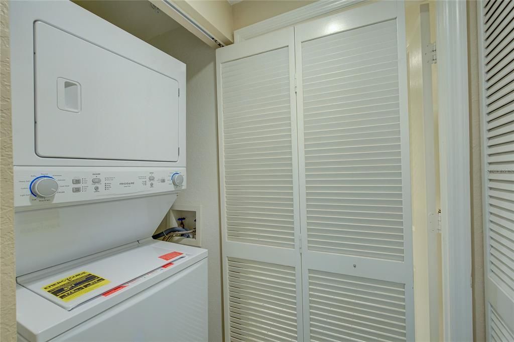 your laundry closet with washer and dryer.