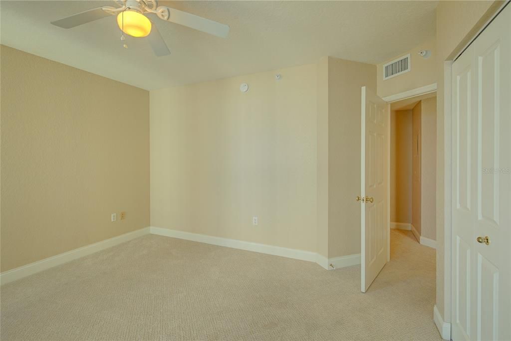 Split plan guest room...with good closet space and plenty of room for a king sized bed!