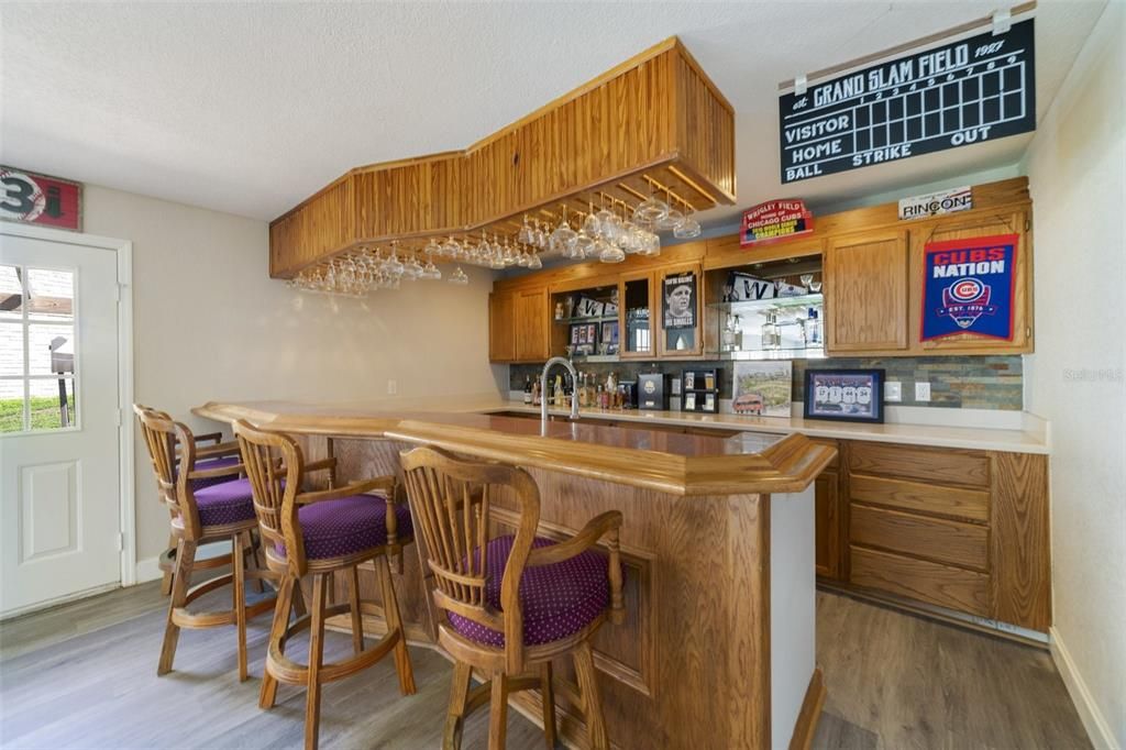 Perfect Game Room with FULL BAR which give game nights a whole new feel.