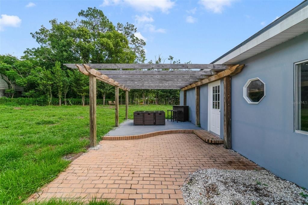 The over half an acre lot includes a fenced backyard where you can spend the Summer poolside and the mature trees around the perimeter add privacy.