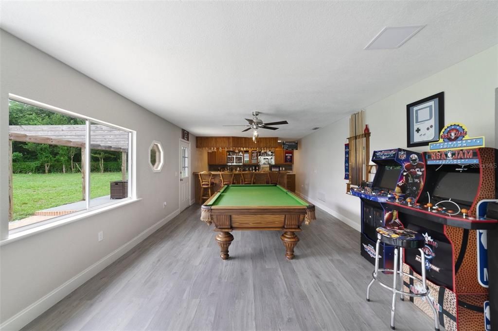 The additional flexibility of the Florida room gives you versatile options that already include a BUILT-IN OFFICE area, game space and FULL BAR.