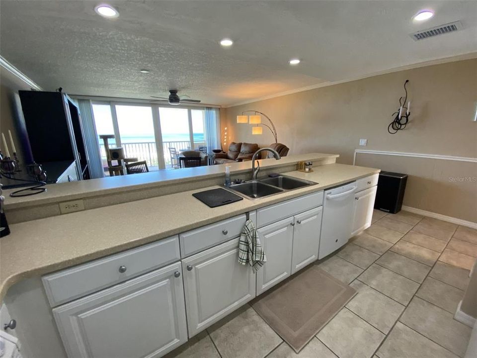 Fully equipped bright kitchen with great counter area